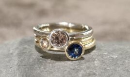 Ringe in 585 Gelb und Weißgold mit Brillanten und Saphir